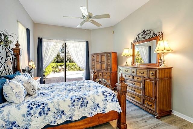 bedroom featuring access to exterior, ceiling fan, and light wood-type flooring