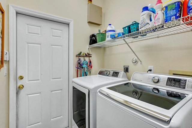 laundry room featuring washing machine and dryer