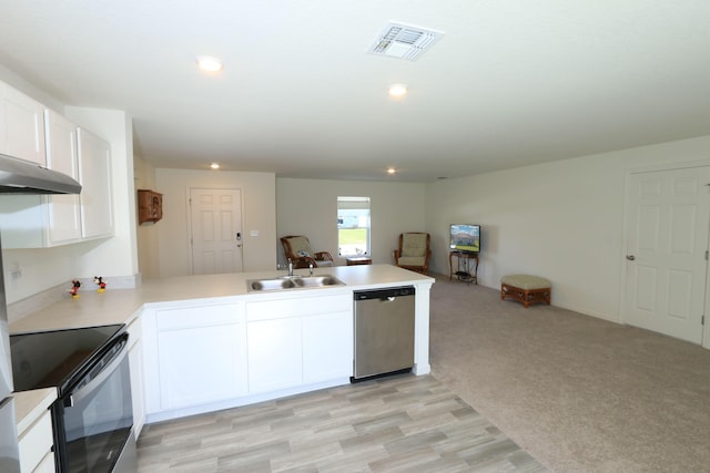 kitchen with kitchen peninsula, light carpet, stainless steel dishwasher, sink, and white cabinets