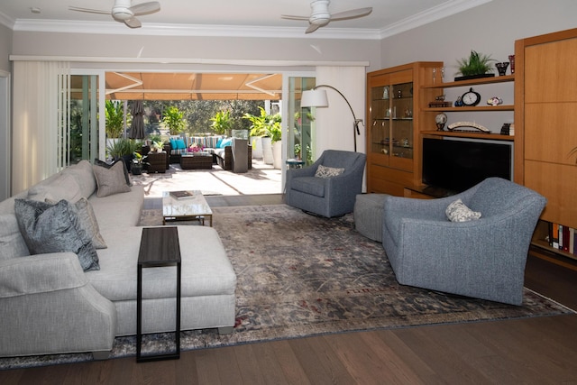 living room with ceiling fan, dark wood-type flooring, and crown molding