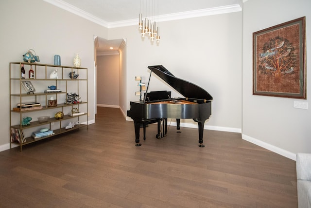 miscellaneous room with ornamental molding and dark hardwood / wood-style flooring