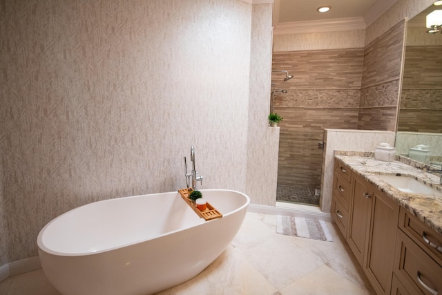 bathroom featuring separate shower and tub, vanity, and ornamental molding