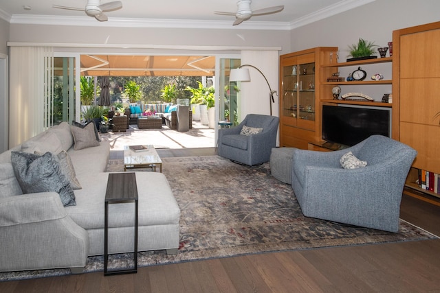 living room with ceiling fan, ornamental molding, and dark hardwood / wood-style floors