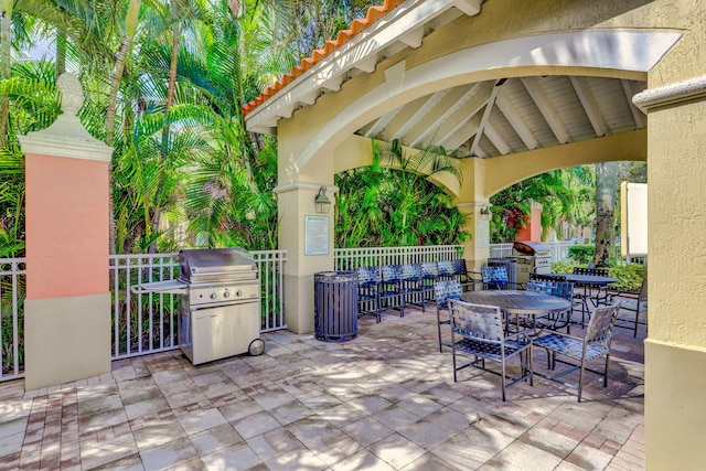 view of patio featuring a gazebo and area for grilling