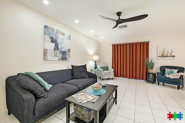 tiled living room featuring ceiling fan