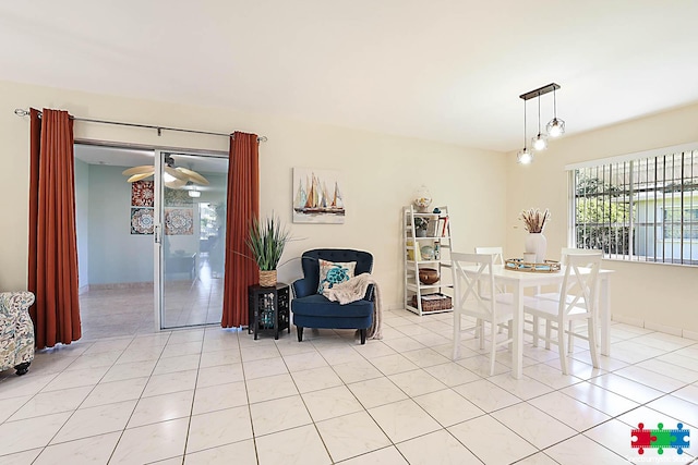 dining area featuring light tile patterned floors