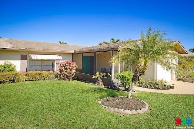 ranch-style house with a front yard