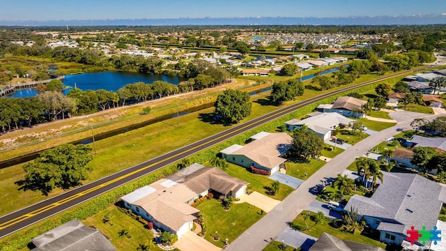 drone / aerial view with a water view