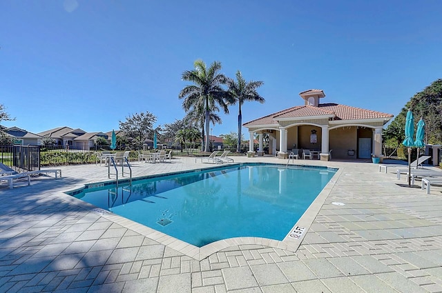 view of pool featuring a patio