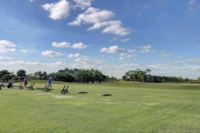 surrounding community featuring a lawn