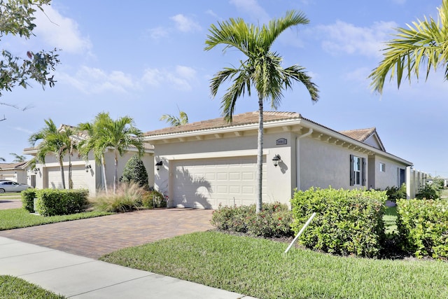 view of front of property with a garage