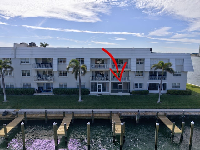 view of building exterior featuring a water view