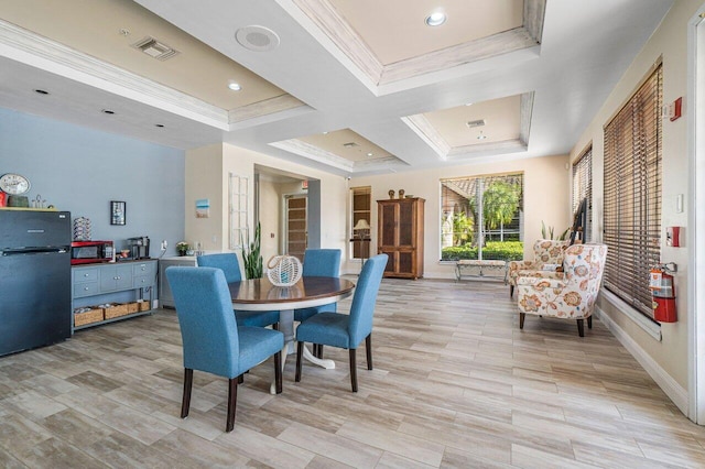 dining area with crown molding