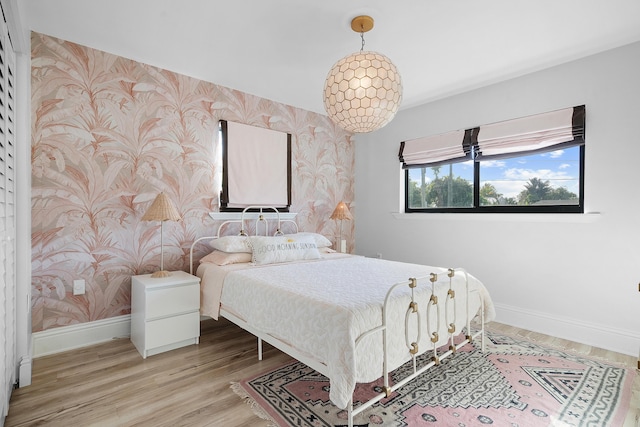 bedroom featuring hardwood / wood-style floors