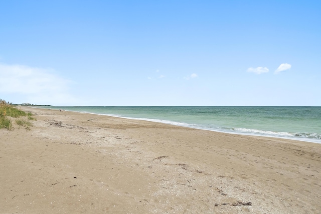 property view of water featuring a view of the beach