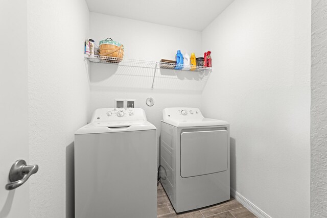 laundry room featuring independent washer and dryer