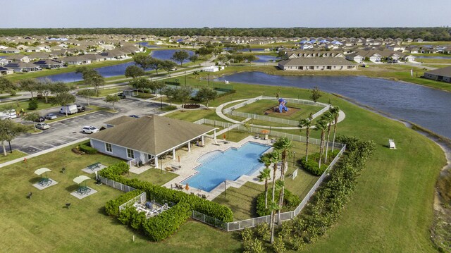 bird's eye view with a water view