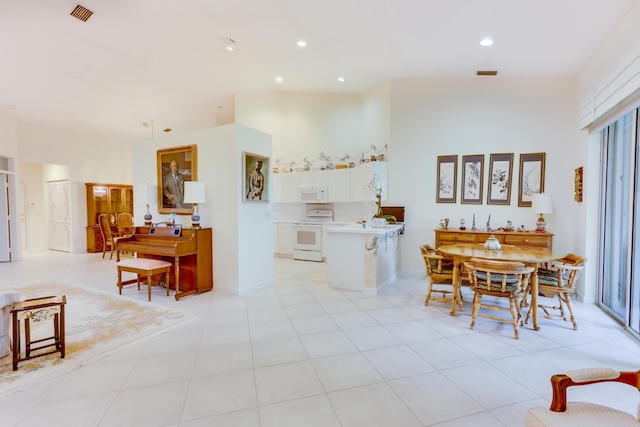 dining space with light tile patterned flooring