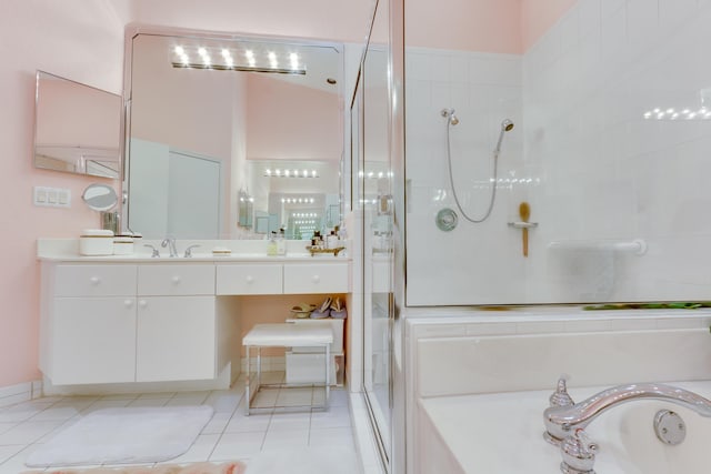 bathroom with vanity, tile patterned floors, and independent shower and bath