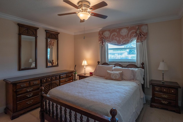 bedroom featuring ornamental molding, ceiling fan, and light carpet