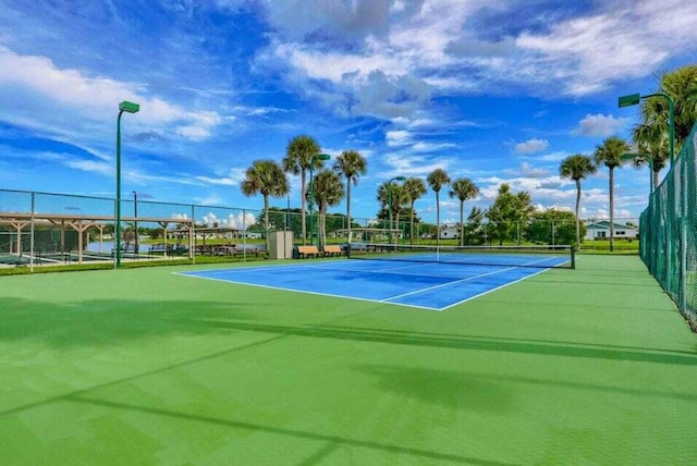 view of tennis court with basketball court