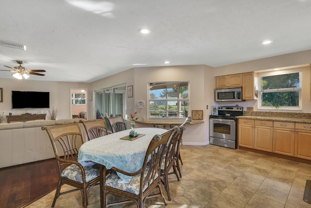 dining space with ceiling fan