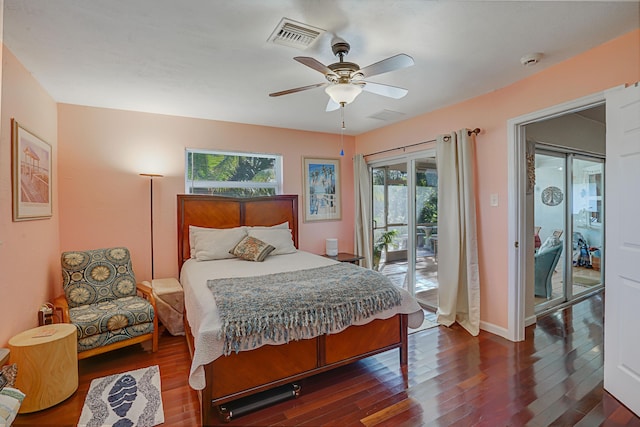 bedroom with access to outside, ceiling fan, and dark wood-type flooring