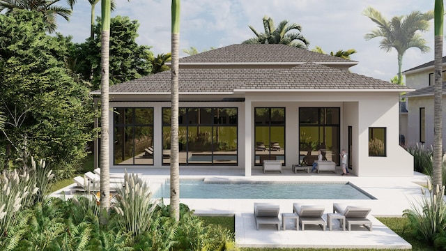 back of property featuring an outbuilding and a patio