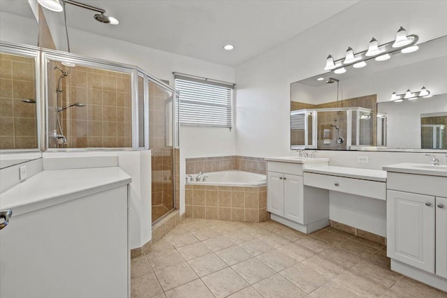 bathroom with tile patterned floors, vanity, and plus walk in shower