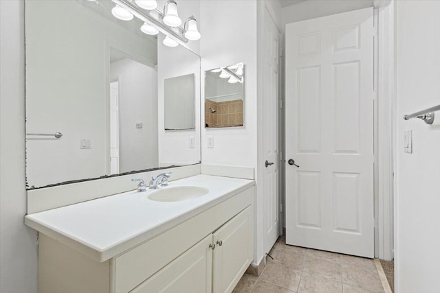 bathroom with vanity and tile patterned floors