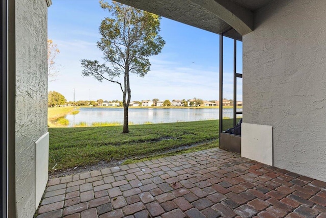 view of patio / terrace featuring a water view