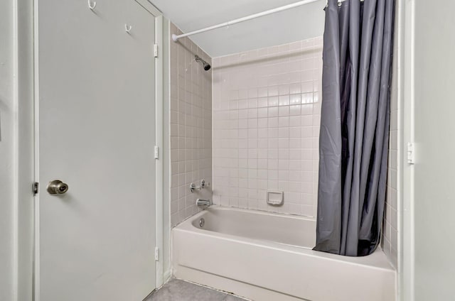 bathroom with tile patterned floors and shower / bathtub combination with curtain