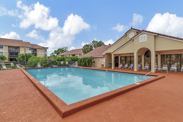 view of swimming pool featuring a patio