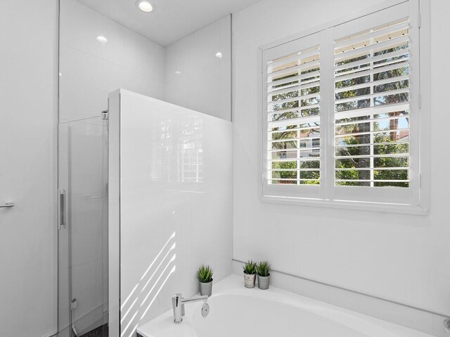 full bathroom featuring toilet, shower / bath combo, tile patterned flooring, a textured ceiling, and vanity