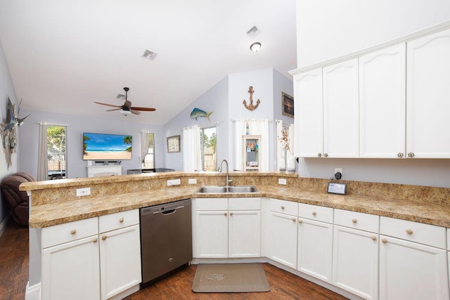 kitchen with white cabinetry, sink, stainless steel dishwasher, kitchen peninsula, and lofted ceiling