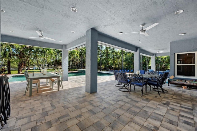 view of patio with ceiling fan