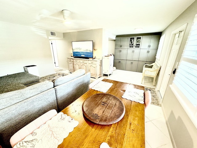 living room featuring light tile patterned floors