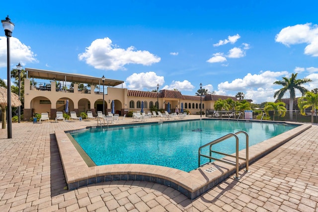 pool featuring a patio area