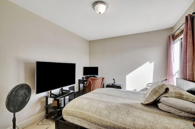 bedroom featuring tile patterned flooring