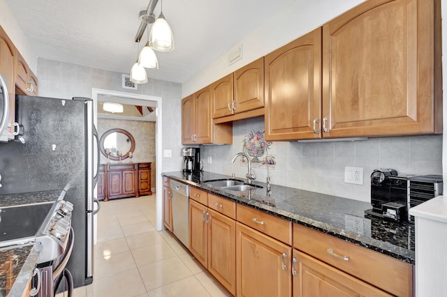 kitchen featuring decorative backsplash, stainless steel dishwasher, light tile patterned floors, electric range, and hanging light fixtures