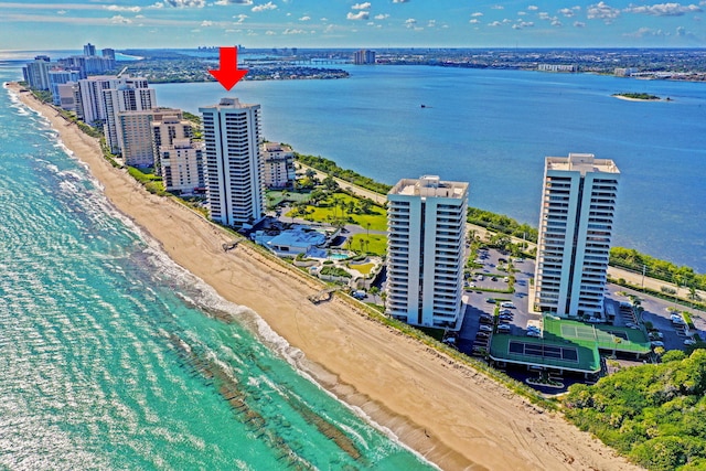 aerial view featuring a water view and a view of the beach