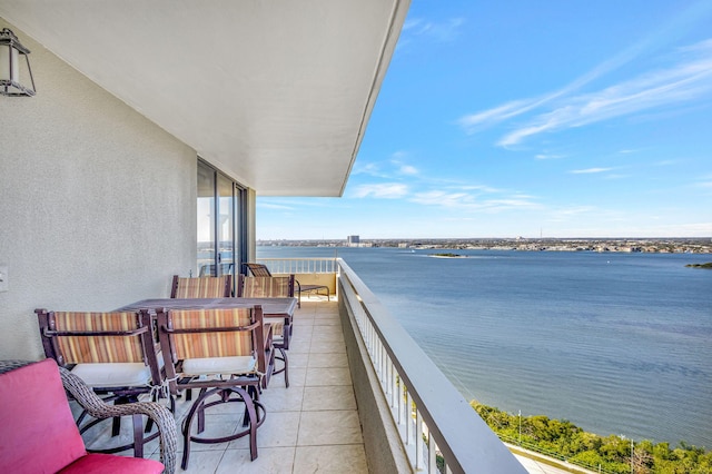 balcony featuring a water view