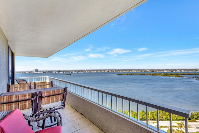 balcony featuring a water view