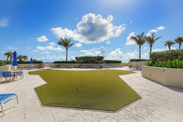 view of community with a patio