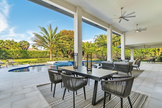 view of patio featuring an outdoor living space and ceiling fan