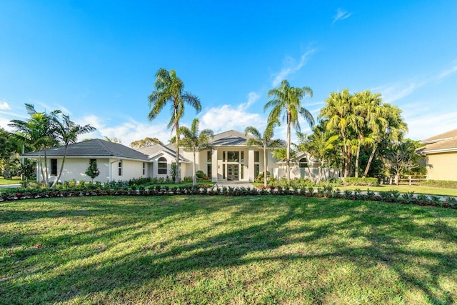 single story home with a front yard