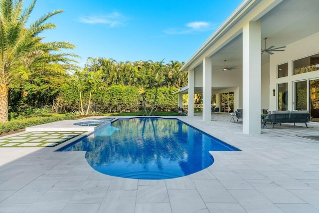 view of swimming pool with an in ground hot tub, an outdoor hangout area, ceiling fan, and a patio area