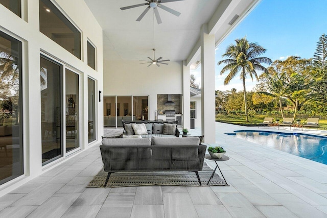 exterior space with an outdoor hangout area and ceiling fan