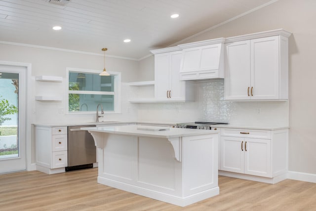 kitchen featuring white cabinetry, dishwasher, and sink