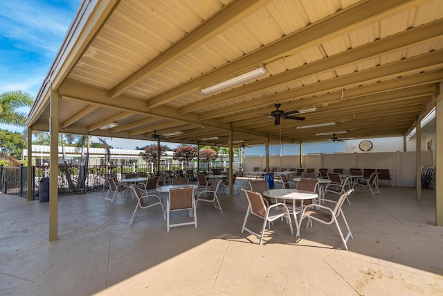 view of patio / terrace with outdoor dining space, a ceiling fan, and fence